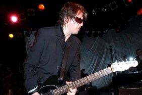 Duran Duran's Andy Taylor performing in 2003