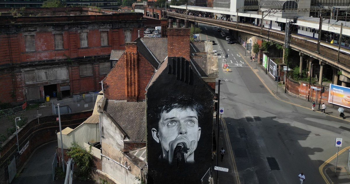 Joy Division's Ian Curtis Mural Restored in Manchester