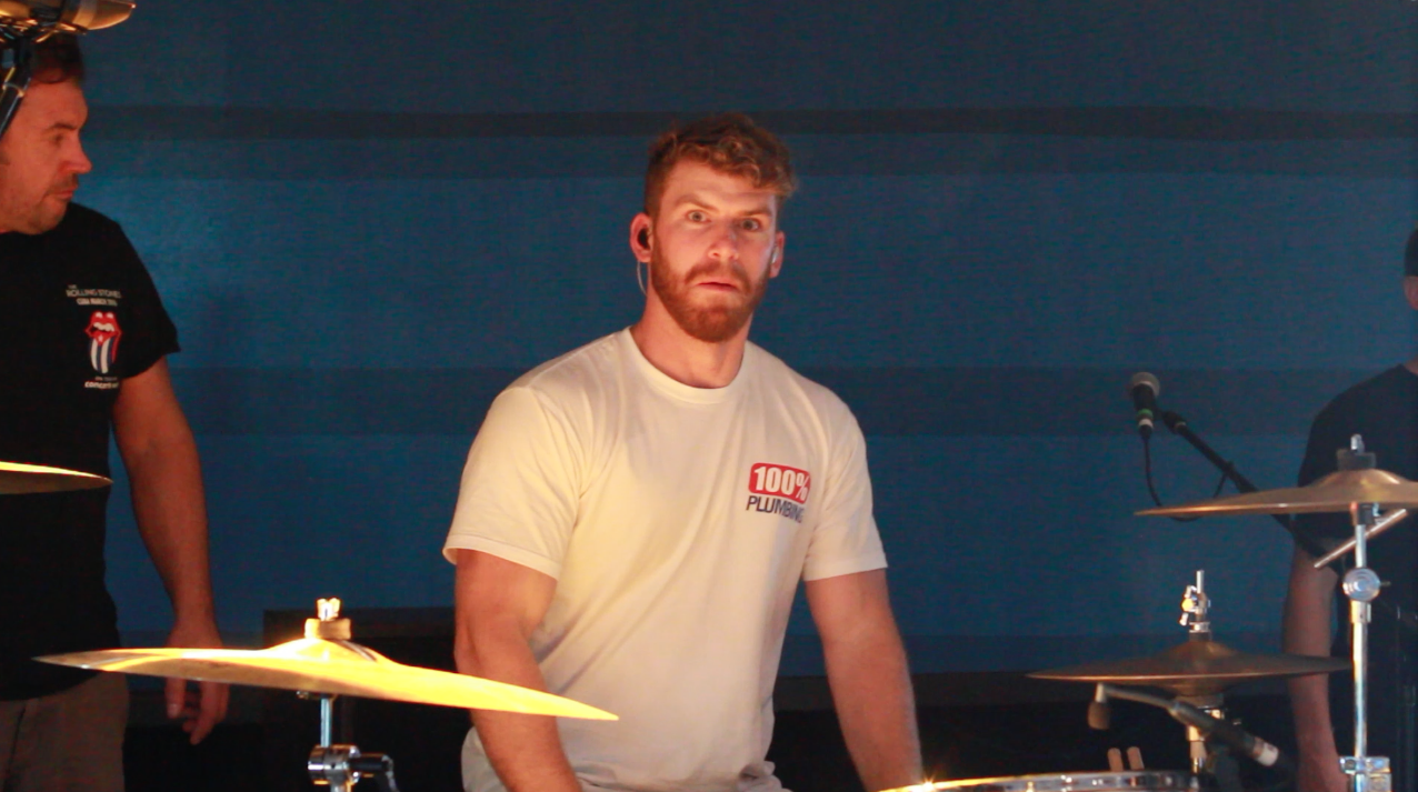 Scott on the drums